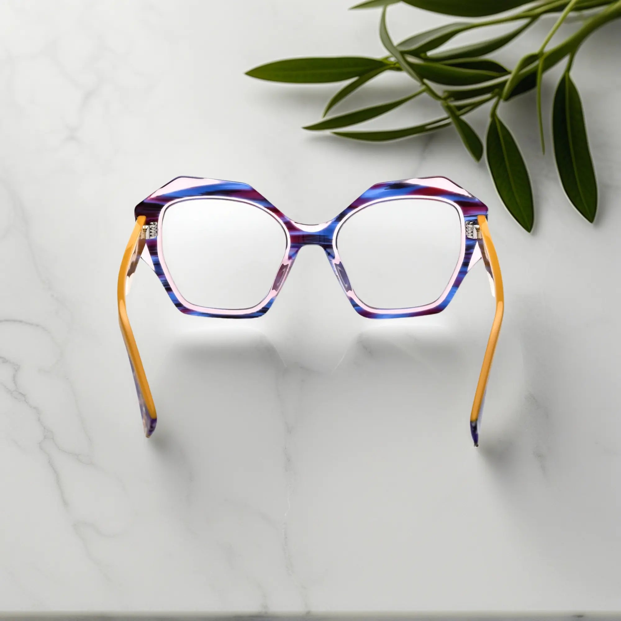 Back view featuring the rich amber color blend and geometric eyewear shape.